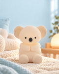 Veilleuse en forme de koala dans une chambre douce